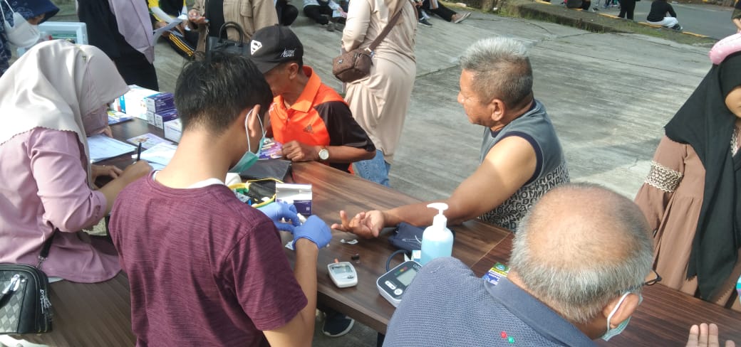 Pengabdian Masyarakat di Gor Sempaja